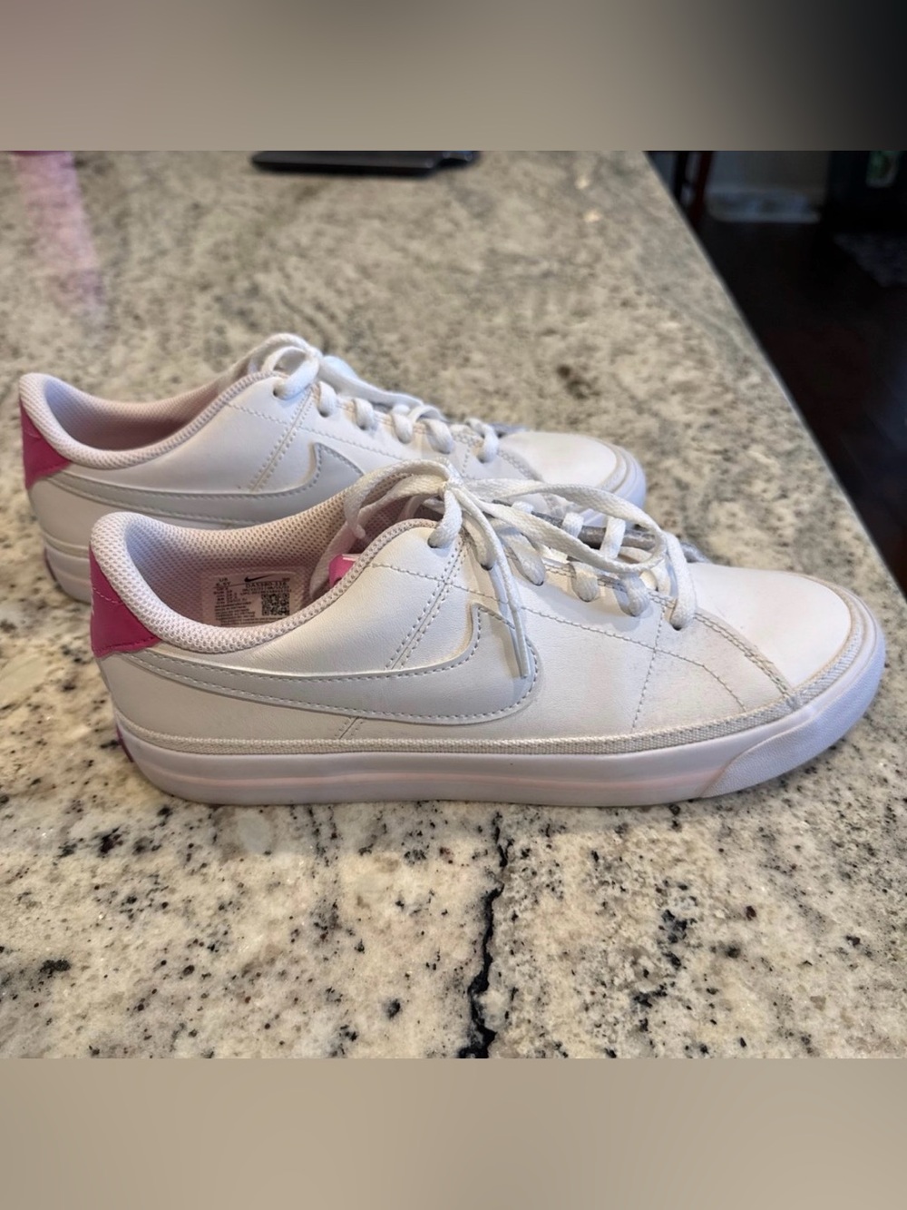Nike Women’s White Sneakers with Pink Heel Accent
